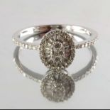 An 18ct gold vari-cut diamond cluster ring