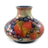 William Moorcroft, a Flambe Leaf and Berry vase