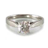 A platinum brilliant-cut diamond single-stone ring