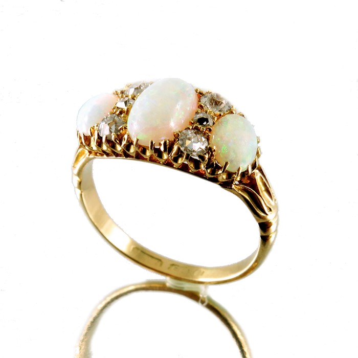 A late Victorian 18ct gold opal and diamond dress ring