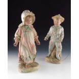 Two Gebruder Heubach bisque figures of children playing