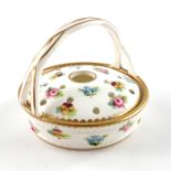 A Minton pot pourri basket and cover painted with spring flowers