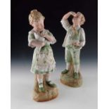 A pair of Gebruder Heubach bisque figures of children