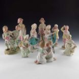 A collection of Gebruder Heubach bisque children figures