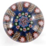 Paul Ysart, concentric millefiori paperweight on royal blue ground with central circle of packed can