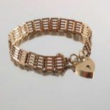 A 9ct gold gate bracelet, with heart-shape padlock clasp