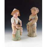 A pair of Gebruder Heubach bisque figures of children