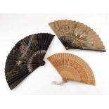 Three fans, a late 18th century Chinese folding fan with double paper leaf, Qing Dynasty, the slende