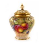 J Freeman, for Royal Worcester, a pot pourri vase and cover, circa 1956, painted with fallen fruit