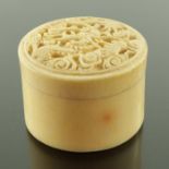 A 19th century Chinese carved ivory box and cover