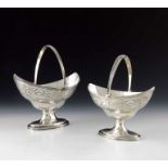 A pair of George III silver graduated baskets, Peter and Ann Bateman, London 1796