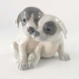 Erik Nielsen for Royal Copenhagen, a Pointer Puppies figure group