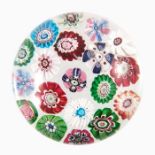 Clichy, spaced millefiori paperweight, containing nineteen individual canes, including a Clichy Pink