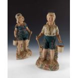 A pair of Gebruder Heubach bisque figures of beach children