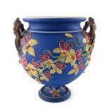 A Wedgwood relief moulded polychrome enamelled Jasperware vase