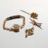 A selection of jewellery and two watches.