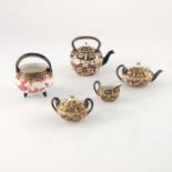 A Royal Crown Derby miniature Imari tea set, together with a kettle and a cauldron