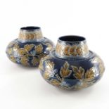 Eliza Simmance for Doulton Lambeth, a pair of pair of squat circular vases