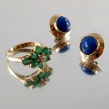 A pair of lapis lazuli earrings and an emerald dress ring