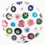 Clichy, spaced millefiori paperweight, containing thirty-seven individual canes, including a Clichy