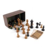 A large piece boxwood and ebony weighted chess set