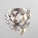 A 9ct gold cultured pearl and diamond dress ring