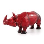 Charles Noke for Royal Doulton, a Flambe Rhino figure