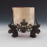 A 19th century bronze and ivory brush pot