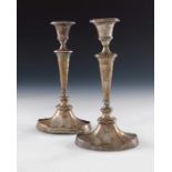 A pair of George V silver candlesticks, Jones and Crompton, Birmingham 1919