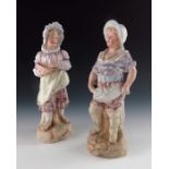 A pair of Gebruder Heubach bisque figures of children