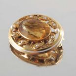An early 20th century 14ct gold, citrine, enamel and seed pearl brooch