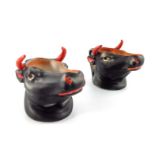 A pair of Royal Bayreuth porcelain black Cow creamers