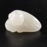 A Chinese carved white jade pendant