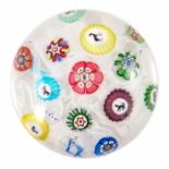 Baccarat, spaced millefiori paperweight set with thirteen individual canes, including six Gridel sil