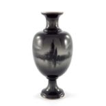 A Royal Worcester black and white vase, baluster footed form