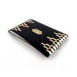An Art Deco mixed metal and lacquer cigarette case