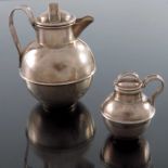 A Victorian silver Guernsey jug and a miniature example, Abraham Meyer Blackensee for A P Rogers of