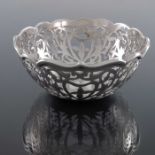 An Elizabeth II silver reticulated bowl, C J Vander, Sheffield 1998