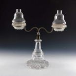 A Victorian silver plate and glass Clarke's 'Cricklite' twin branch candelabra