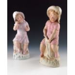 A pair of Gebruder Heubach bisque figures of seaside children