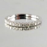 An 18ct gold diamond half eternity ring