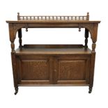 An Aesthetic Movement oak buffet sideboard