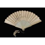 λ A 19th century Chinese carved ivory fan