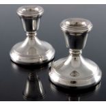 A pair of Elizabeth II silver dwarf candlesticks, C Ltd., Birmingham 1990