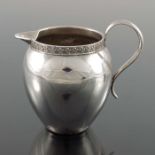 A Dutch silver jug, import marks, Singleton, Benda & Co., London 1903