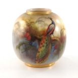 W H Austin, for Royal Worcester, a vase, circa 1926, painted with a peacock perching