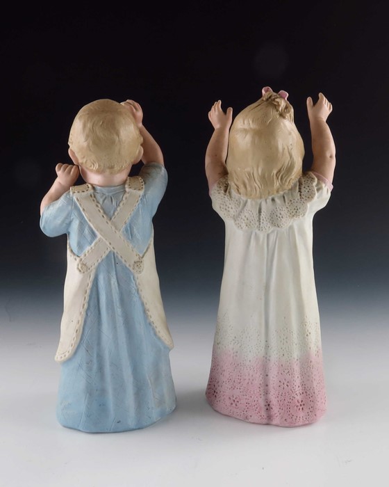 A pair of Gebruder Heubach bisque figures of young children playing - Image 2 of 3