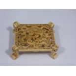 A Chinese 18th century ivory pot stand W.8.5cm H.2.5cm,