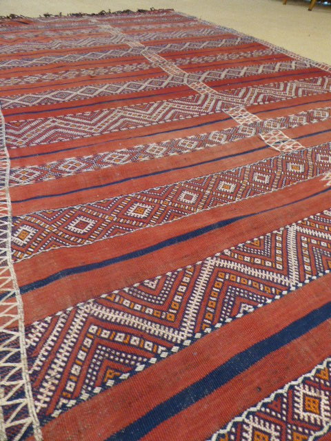 Red ground Afghan rug