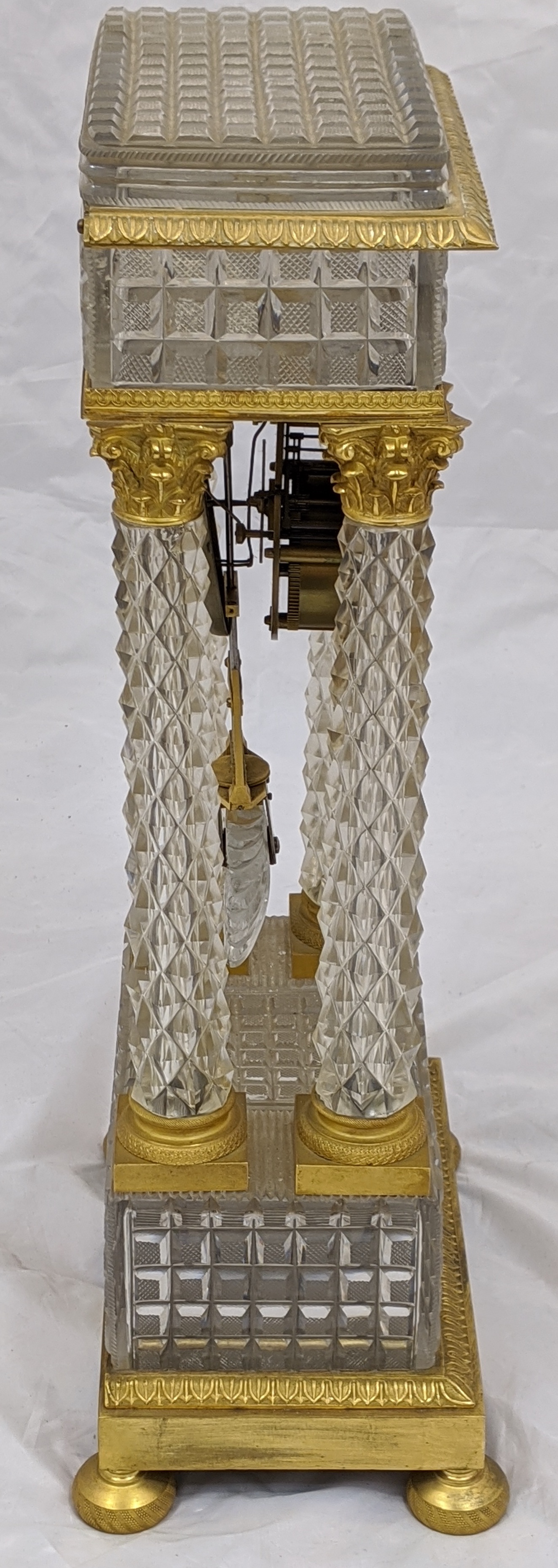 A French Empire Portico clock,four crystal column supports mounted with ormolu Corinthians with - Image 6 of 9